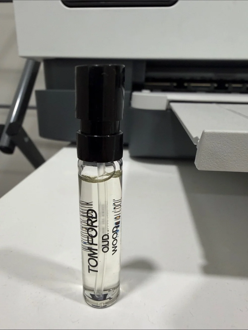 Tom Ford Oud Wood Sample Spray - Black Cap, Clear Liquid
